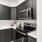 a kitchen with black appliances