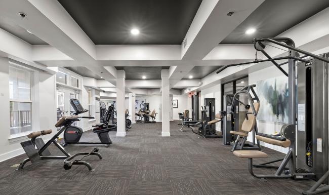 Settle into comfort at The Lookout O4W a gym with exercise equipment