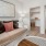 a room with a couch and a rug