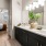 a bathroom with a large mirror