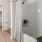 a bathroom with a bathtub and toilet