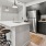 a kitchen with black cabinets