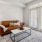 a living room with a couch and a table